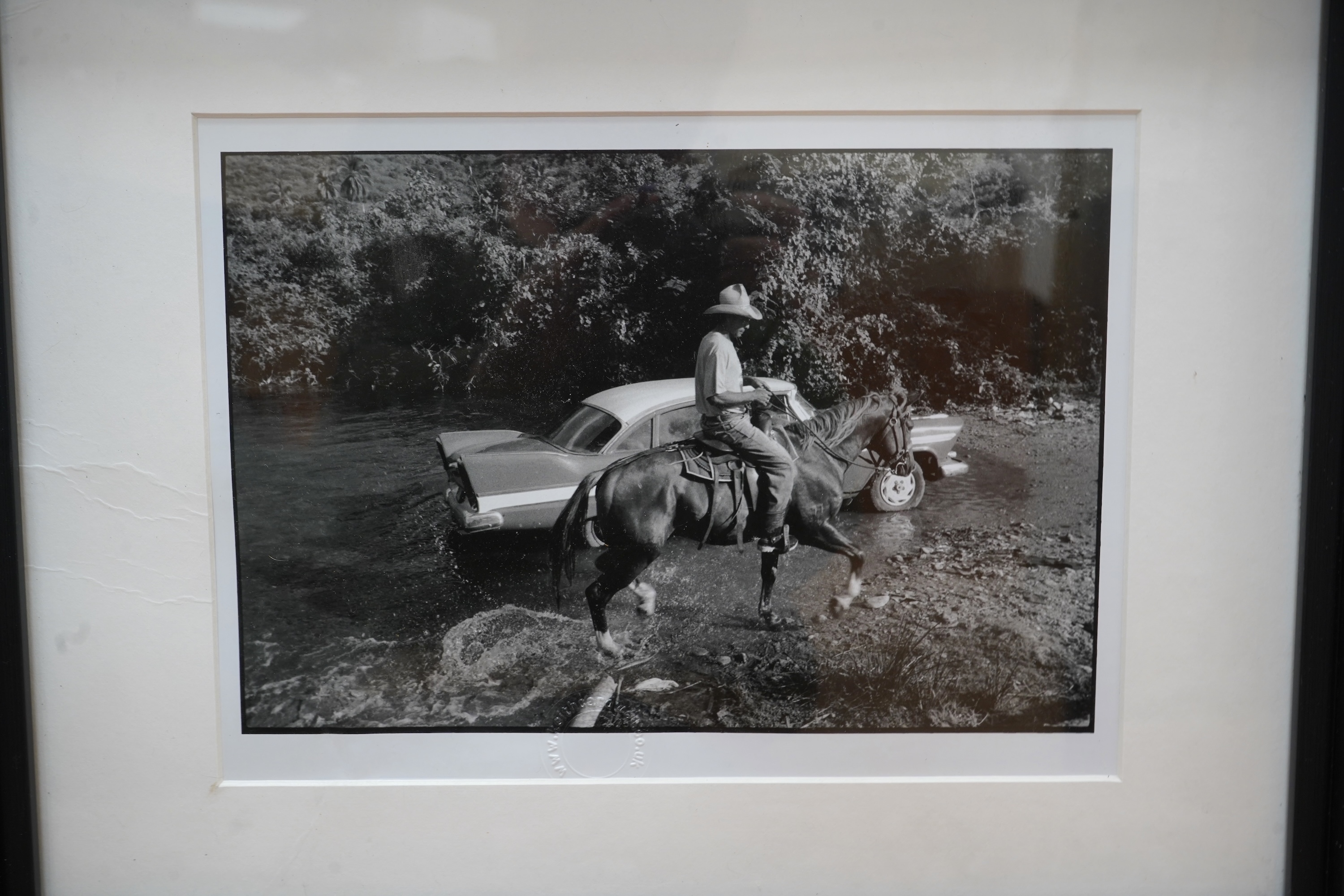Keith Cardwell (Contemporary), Three gelatin silver prints to include ‘Old Man and the Sea, Cuba’, stamped, signed and titled in ink to the margin and ‘Korda with his Che’, stamped, largest 25 x 17cm, together with a boo